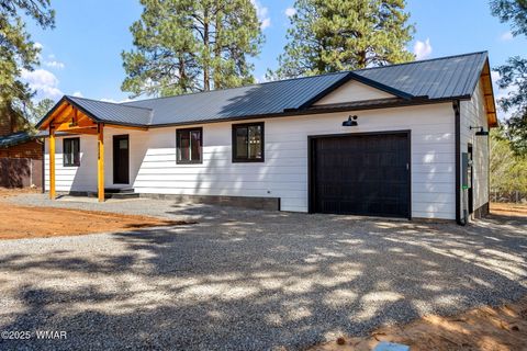 Photo of 1982 Christmas Pine, Overgaard, AZ 85933 (MLS # 257845)