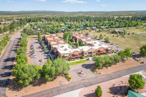Tiny photo for 2409 Quarter Horse Trail #227, Overgaard, AZ 85933 (MLS # 261293)