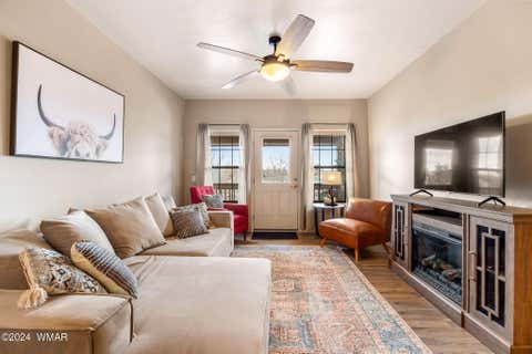 Tiny photo for 2409 Quarter Horse Trail #227, Overgaard, AZ 85933 (MLS # 261293)