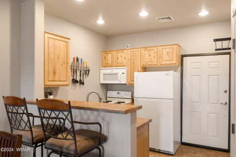Tiny photo for 2409 Quarter Horse Trail #227, Overgaard, AZ 85933 (MLS # 261293)