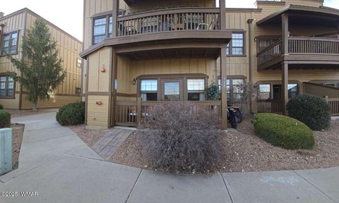 Photo of 2417 Quarter Horse Trail #115, Overgaard, AZ 85933 (MLS # 259027)