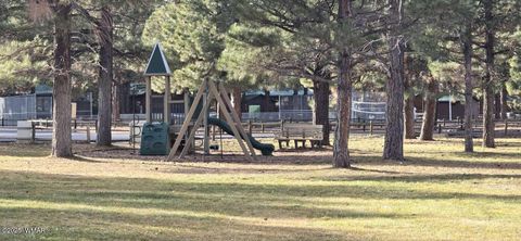 Tiny photo for 2417 Quarter Horse Trail #115, Overgaard, AZ 85933 (MLS # 259027)