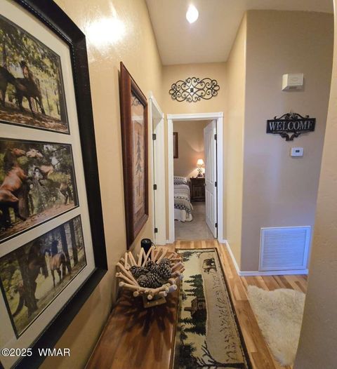 Tiny photo for 2417 Quarter Horse Trail #115, Overgaard, AZ 85933 (MLS # 259027)