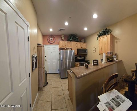 Tiny photo for 2417 Quarter Horse Trail #115, Overgaard, AZ 85933 (MLS # 259027)