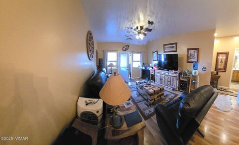 Tiny photo for 2417 Quarter Horse Trail #115, Overgaard, AZ 85933 (MLS # 259027)