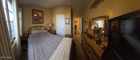 Tiny photo for 2417 Quarter Horse Trail #115, Overgaard, AZ 85933 (MLS # 259027)