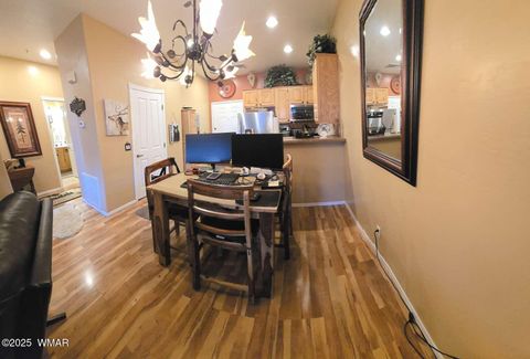 Tiny photo for 2417 Quarter Horse Trail #115, Overgaard, AZ 85933 (MLS # 259027)