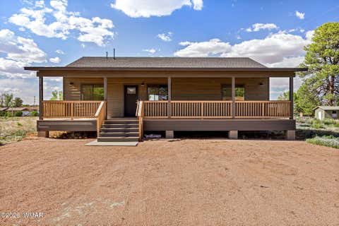 Photo of 2202 Page Drive, Overgaard, AZ 85933 (MLS # 261279)