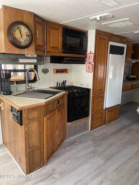 Tiny photo for 181 N 6TH Drive #13, Show Low, AZ 85901 (MLS # 255938)
