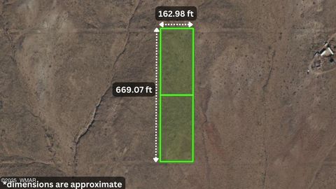 Tiny photo for 0 ARIZ RANCHO #85 Lots 005 & 024, Sun Valley, AZ 86029 (MLS # 258777)