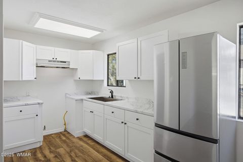 Tiny photo for 2056 Shot Gun Road, Overgaard, AZ 85933 (MLS # 258684)