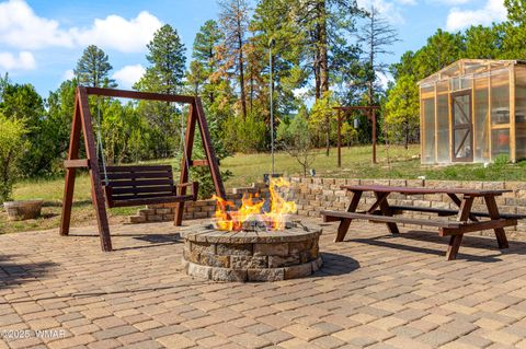 Tiny photo for 2003 Little Doe Trail, Overgaard, AZ 85933 (MLS # 257851)