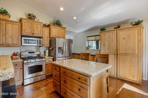 Photo of 2003 Little Doe Trail, Overgaard, AZ 85933 (MLS # 257851)