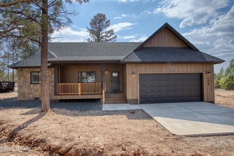 Photo of 1028 School House Lane, Show Low, AZ 85901 (MLS # 256884)
