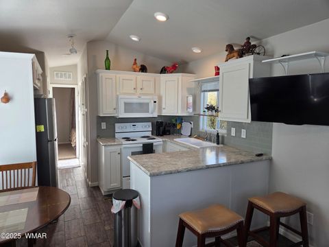 Tiny photo for 1914 Foxtrot Lane #95, Show Low, AZ 85901 (MLS # 258581)