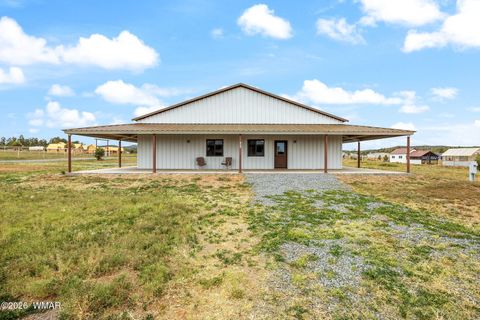 Photo of 1091 School House Ln, Show Low, AZ 85901 (MLS # 260726)