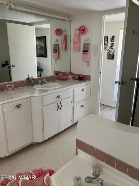 Tiny photo for 2042 Supancheck Road, Show Low, AZ 85901 (MLS # 259088)