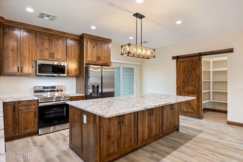 Tiny photo for 201 N Canyon Loop, Show Low, AZ 85901 (MLS # 258327)