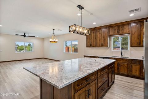 Tiny photo for 201 N Canyon Loop, Show Low, AZ 85901 (MLS # 258327)