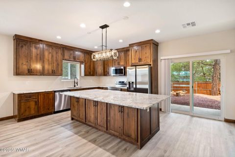 Tiny photo for 201 N Canyon Loop, Show Low, AZ 85901 (MLS # 258327)