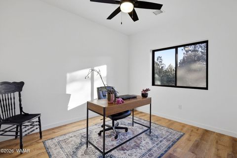 Tiny photo for 2225 Roundabout Way, Overgaard, AZ 85933 (MLS # 259438)