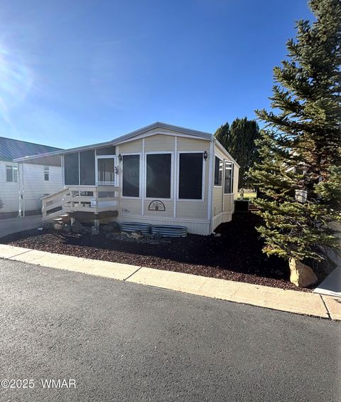 Photo of 1878 Tee Time Lane #144, Show Low, AZ 85901 (MLS # 258622)