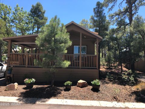 Photo of 3851 Vacation Village Drive #302, Show Low, AZ 85901 (MLS # 257412)