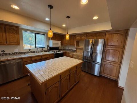 Tiny photo for 1100 N 2nd Place, Show Low, AZ 85901 (MLS # 259587)