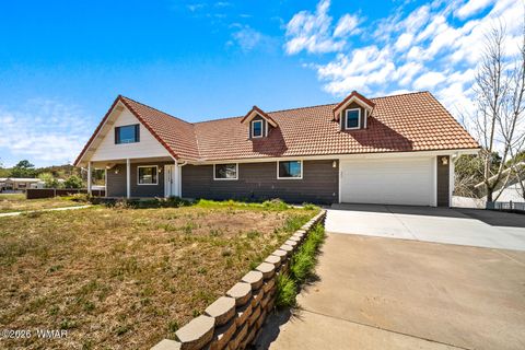 Tiny photo for 1100 N 2nd Place, Show Low, AZ 85901 (MLS # 259587)