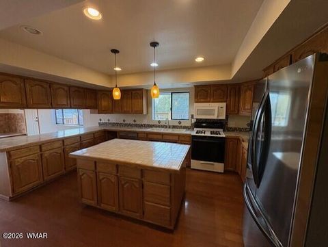 Tiny photo for 1100 N 2nd Place, Show Low, AZ 85901 (MLS # 259587)