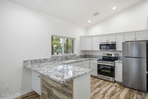 Tiny photo for 1979 Christmas Pine Circle, Overgaard, AZ 85933 (MLS # 258735)