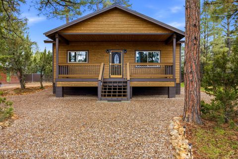 Photo of 1979 Christmas Pine Circle, Overgaard, AZ 85933 (MLS # 258735)