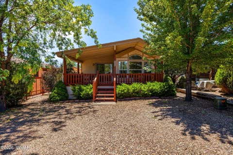 Photo of 2225 Old Crooks Trail, Overgaard, AZ 85933 (MLS # 262129)
