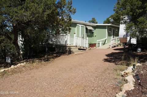 Tiny photo for 1988 Bradley Lane, Overgaard, AZ 85933 (MLS # 257984)