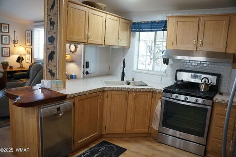 Tiny photo for 1988 Bradley Lane, Overgaard, AZ 85933 (MLS # 257984)