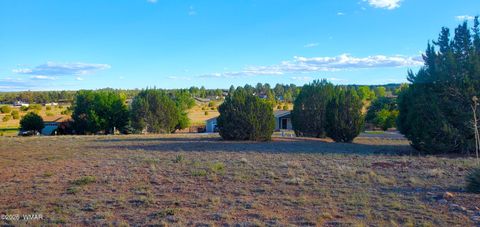 Photo of 7032 Stagecoach Pass, Show Low, AZ 85901 (MLS # 261016)