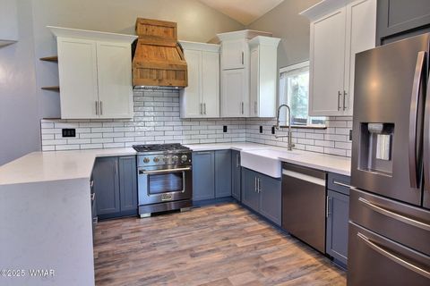 Tiny photo for 221 N Canyon Loop, Show Low, AZ 85901 (MLS # 258146)