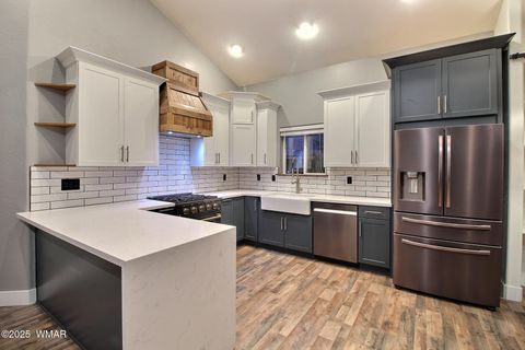 Tiny photo for 221 N Canyon Loop, Show Low, AZ 85901 (MLS # 258146)