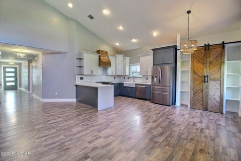 Tiny photo for 221 N Canyon Loop, Show Low, AZ 85901 (MLS # 258146)