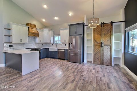 Tiny photo for 221 N Canyon Loop, Show Low, AZ 85901 (MLS # 258146)