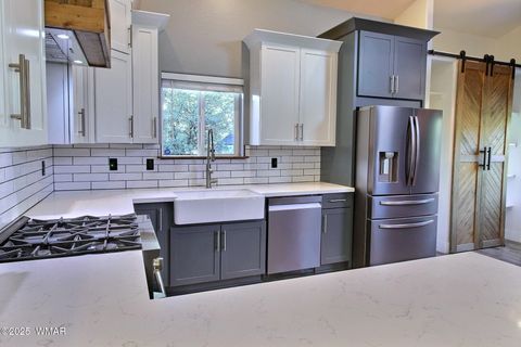 Tiny photo for 221 N Canyon Loop, Show Low, AZ 85901 (MLS # 258146)