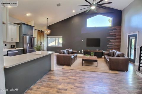 Tiny photo for 221 N Canyon Loop, Show Low, AZ 85901 (MLS # 258146)