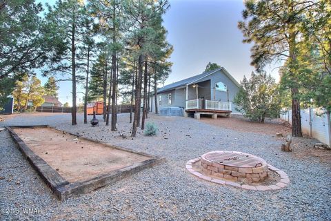 Tiny photo for 221 N Canyon Loop, Show Low, AZ 85901 (MLS # 258146)