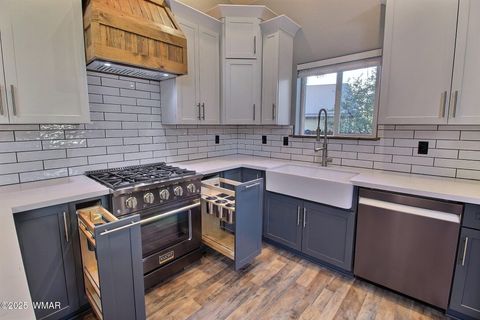 Tiny photo for 221 N Canyon Loop, Show Low, AZ 85901 (MLS # 258146)
