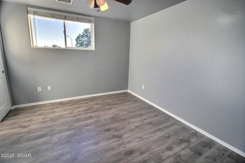 Tiny photo for 221 N Canyon Loop, Show Low, AZ 85901 (MLS # 258146)