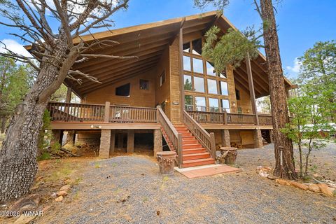 Photo of 1980 Spring Creek Lane, Overgaard, AZ 85933 (MLS # 261565)