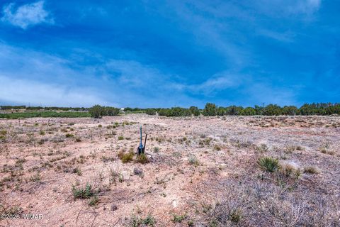 Tiny photo for Lot D TBD Huggins, Show Low, AZ 85901 (MLS # 259713)
