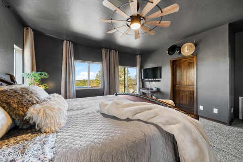 Tiny photo for 7056 Bustin Dutch Trail, Show Low, AZ 85901 (MLS # 261113)