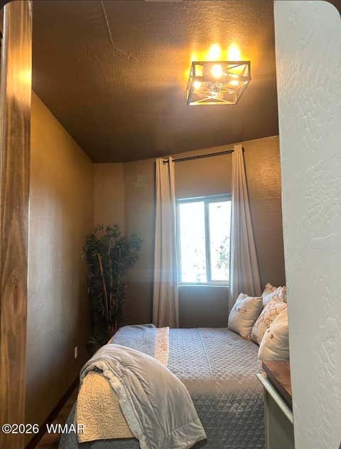 Tiny photo for 7056 Bustin Dutch Trail, Show Low, AZ 85901 (MLS # 261113)