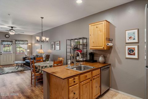 Photo of 2385 Quarter Horse Trail #113, Overgaard, AZ 85933 (MLS # 257032)